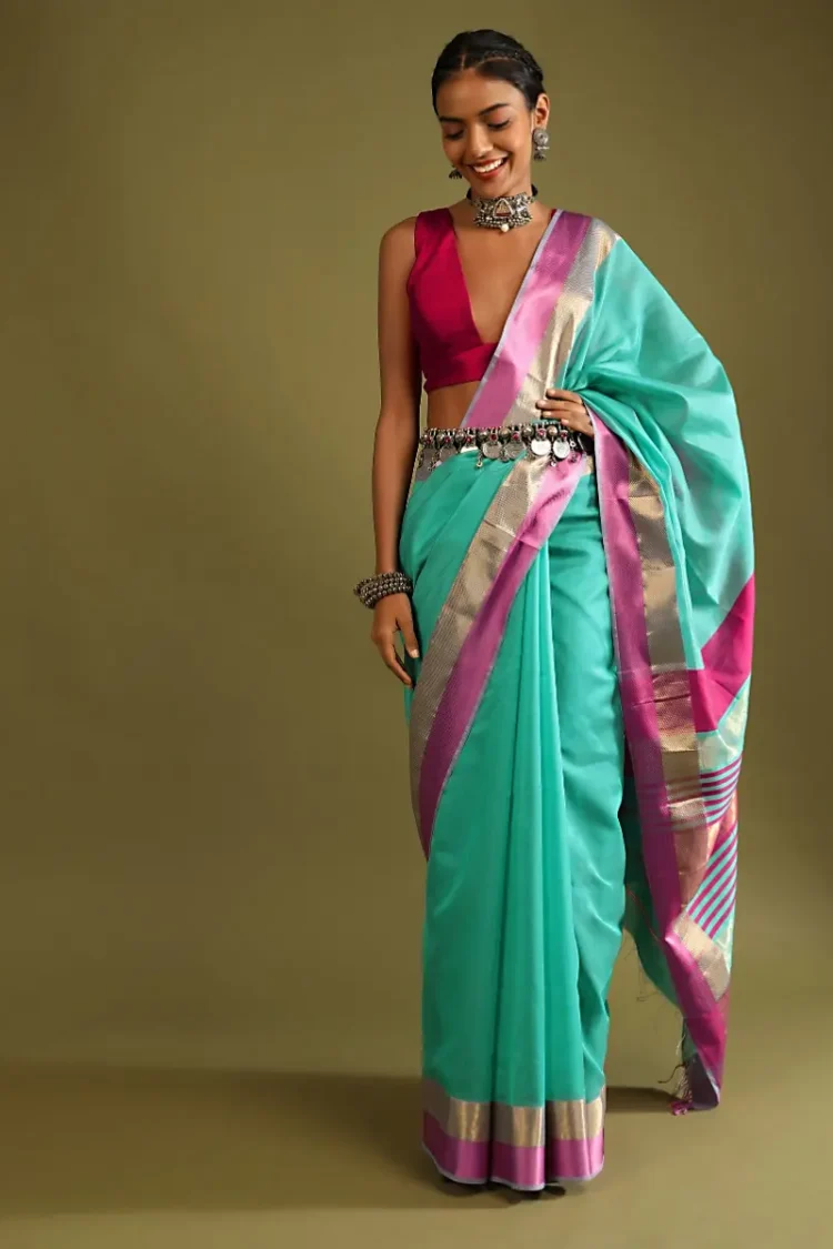 A Gquareen Saree In Tussar Silk With Gold And Pink Woven Border And Striped Pallu Design