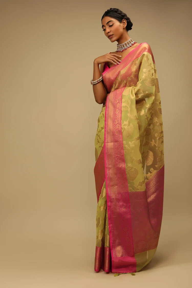 Celery Green Saree In Organza Silk With Golden Brocade Woven Floral Jaal And Magenta Border Design