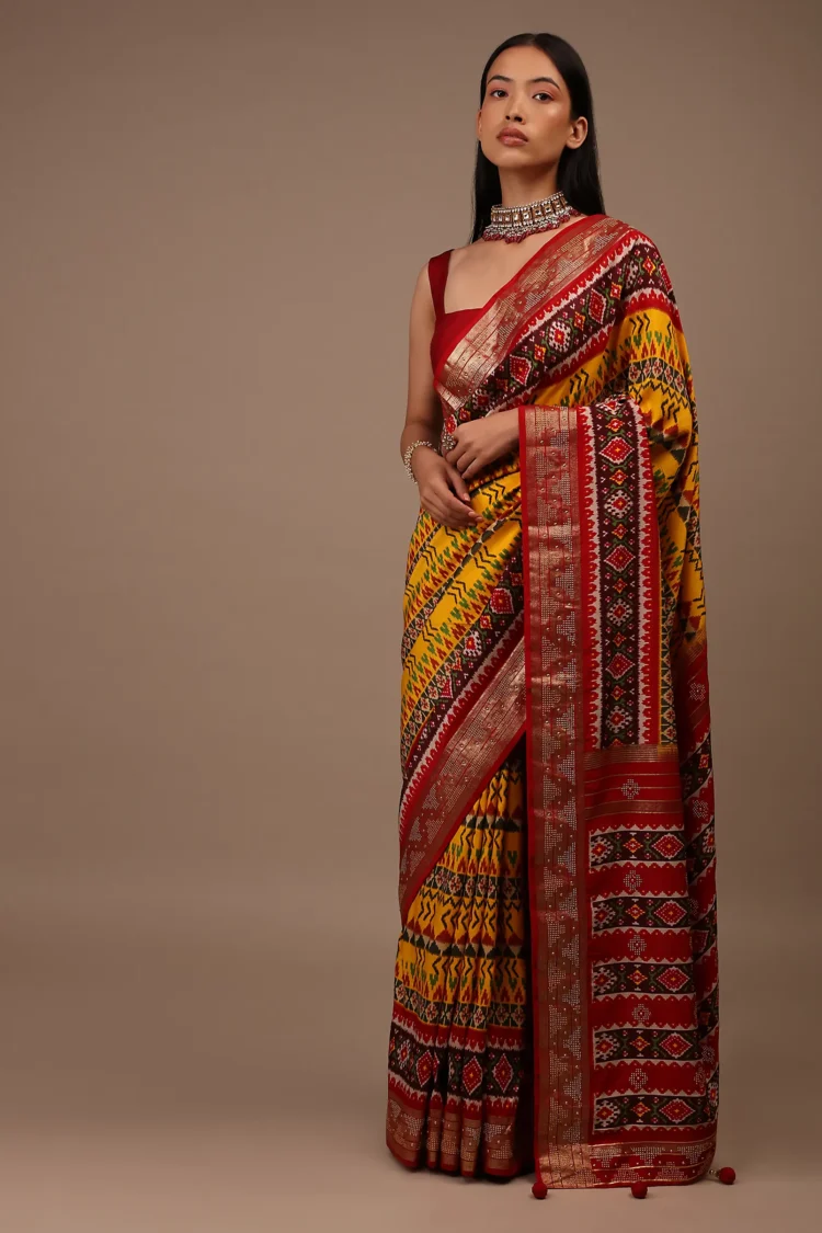 chrome_yellow_saree_in_silk_with_multi_colored_patola5.webp